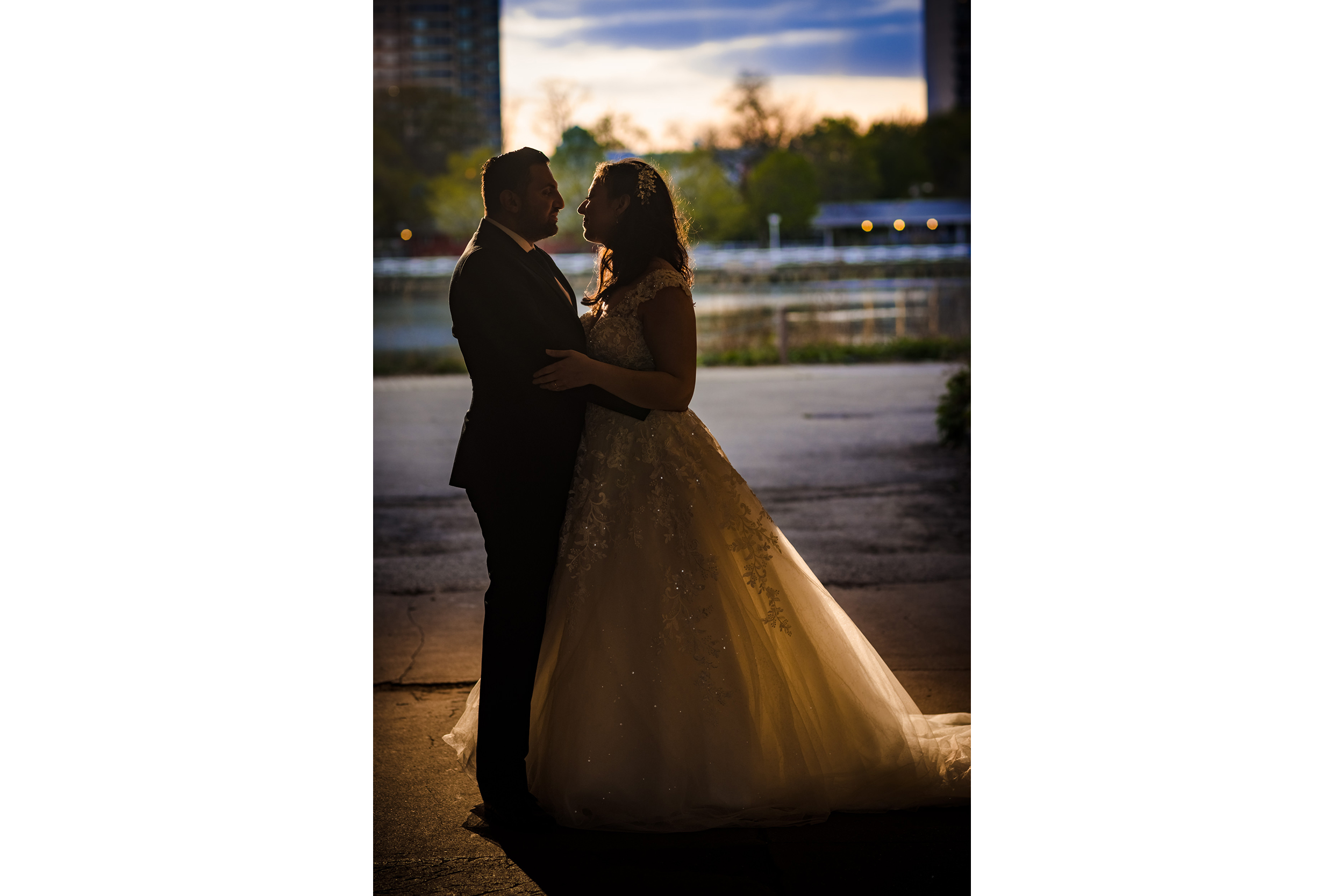 A couple hugs in the sunset during a Lincoln Park elopement in Chicago.